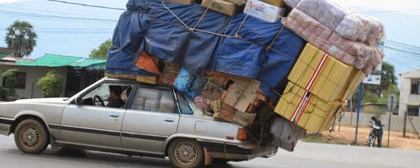 Image result for over packed truck